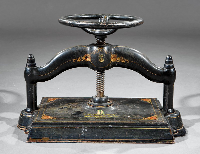 American Cast Iron Book Press, "Chain & Hardy": American Cast Iron Book Press, c. 1882, marked "The Chain & Hardy Book, Stat'y & Art Co., Denver", with gilt and foliate decoration, height closed 13 1/2 in. width 20 1/2 in., depth 11 1/2 in Note: Th