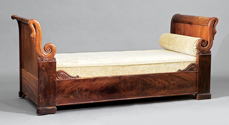 An American or French Classical Mahogany Daybed: An American or French Classical Mahogany Daybed, early 19th c., scrolled head and foot board, fronted by swan's necks, shaped rail, block feet, height 34 1/2 in., width 69 1/2 in., depth 29 1/2 in
