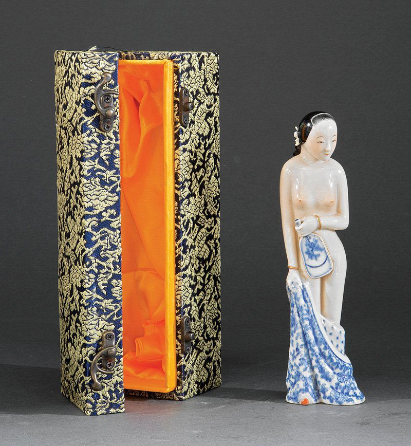Chinese Polychrome Porcelain Figure of a Beauty: A Chinese Polychrome Porcelain Figure of a Beauty, probably 20th c., demure standing nude figure holding a mirror in one hand and loosely falling robes in the other, height 8 1/4 in
