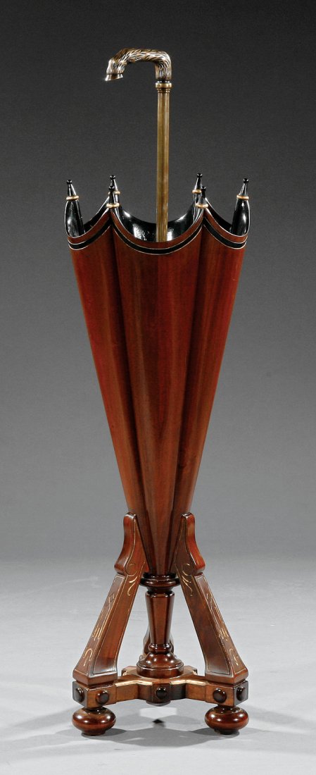 Ebonized and Gilt-Incised Mahogany Umbrella Stand: A Renaissance Revival-Style Ebonized and Gilt-Incised Mahogany Umbrella Stand, bronze hoof mounted rod, bracketed supports, turned stem, bun feet, height 45 1/2 in., width 12 1/2 in