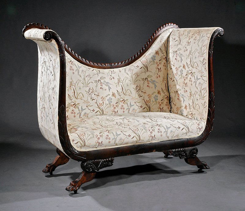 Classical Revival Carved Mahogany Settees: A Pair of American Classical Revival Carved Mahogany Settees, mid-19th c., gadrooned and carved crest rail, scrolled acanthus arms and seat rail, cornucopia bracketed paw feet, height 48 in., width 59