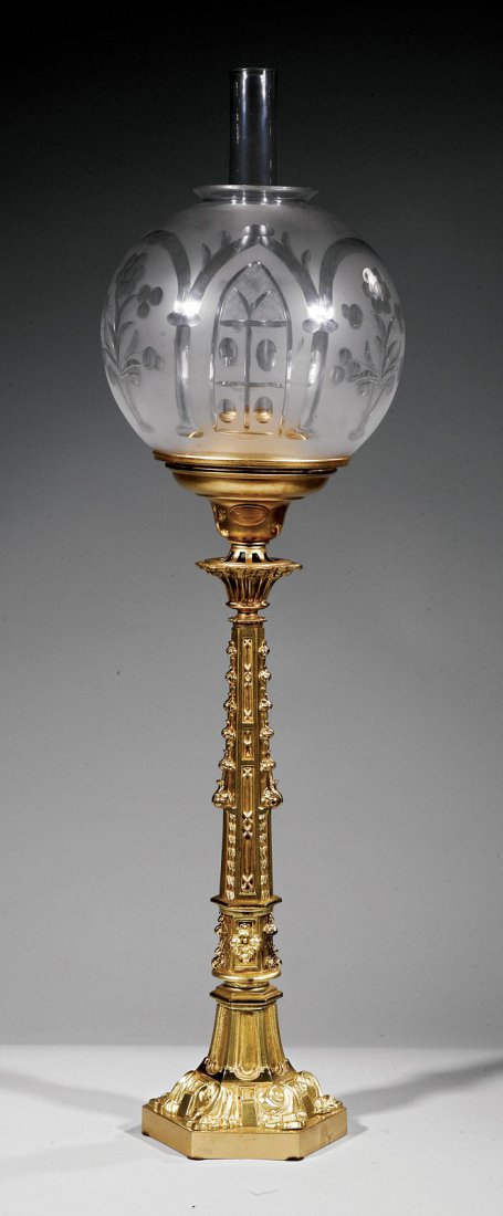 American Gilt Bronze Solar Lamp, Dietz Brothers: An American Gilt Bronze Solar Lamp, c. 1850, labeled Dietz Brothers, New York, tapered columnar standard with anthemion and geometric fretwork, hexagonal base, period frosted globe etched with Gothic 