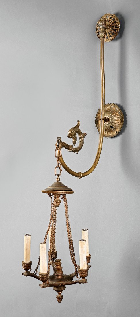 An Bronze Five-Light Hanging Lamp: An Antique Bronze Five-Light Hanging Lamp, 19th c., the light cast with bellflowers and acorn pendant, suspended from a scrolled bracket with lion head terminal, height 42 in., width 16 in., depth 16