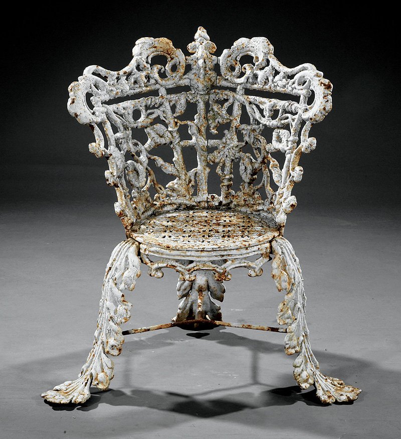 A Group of American Cast Iron Garden Furniture: A Group of Antique American Cast Iron Garden Furniture, 19th c., comprising a vintage motif settee with pierced seat and acanthine legs; a morning glory motif side chair with pierced circular seat and