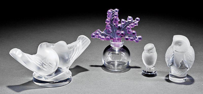 Lalique Clear Glass Perfume Bottle: Lalique "Clairefontaine" Clear Glass Perfume Bottle, engraved "Lalique France", with blue lily molded stopper, h. 4 in.; together with a glass owl figurine, h. 3 1/2 in.; a glass rapace figurine, h. 2