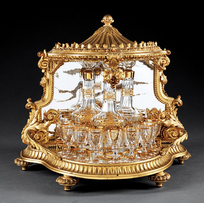 Gilt Bronze and Mirrored Cave à Liqueur: Fine Napoleon III Gilt Bronze and Mirrored Cave à Liqueur, late 19th c., pagoda-form hinged top with egg-and-dart molding, shaped mirrored back framed by grapes and foliate scrolls, mirrored base, to