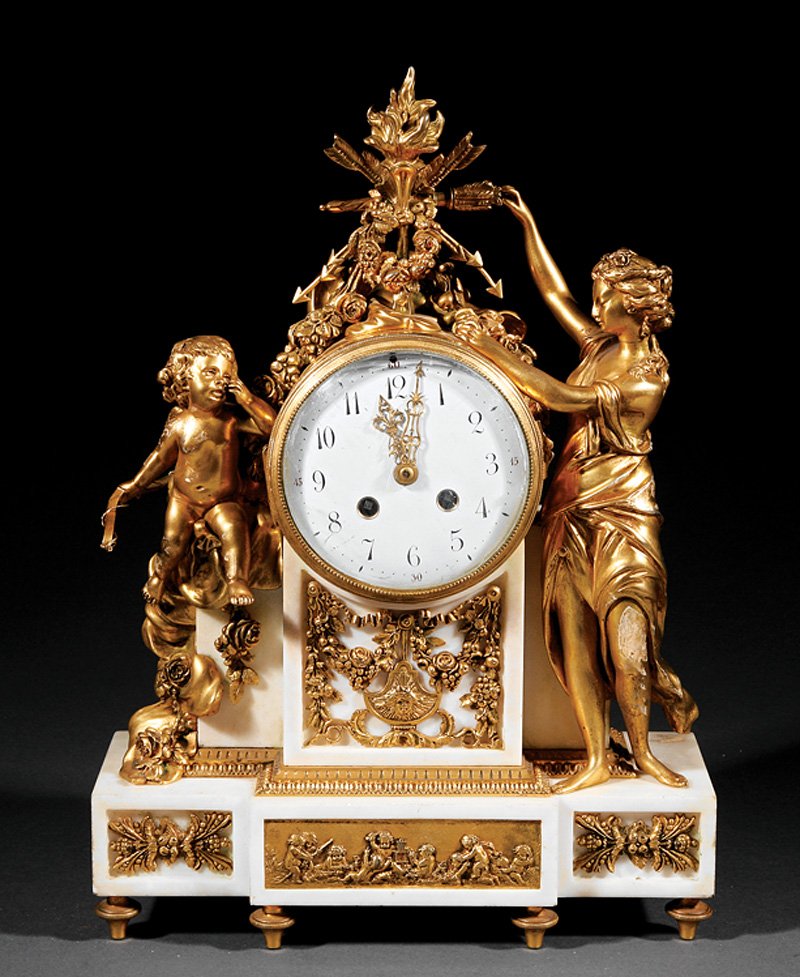 Gilt Bronze and White Marble Mantel Clock: Louis XVI-Style Gilt Bronze and White Marble Mantel Clock, 19th c., striking bell movement, case flanked by figures of Cupid and Venus, surmounted by a trophee with flaming torch, quiver and wreath, b