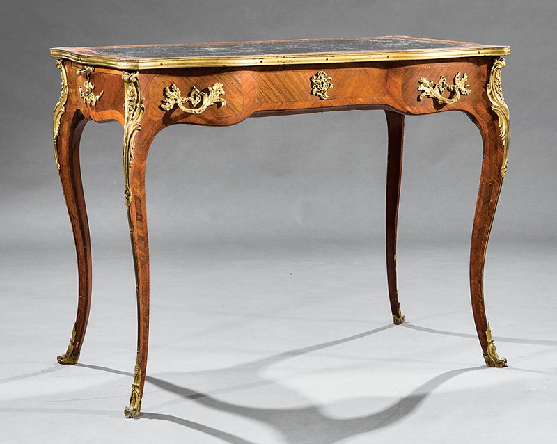 ronze-Mounted Kingwood Table à Écrire: Napoleon III Bronze-Mounted Kingwood Table à Écrire, 19th c., inset tooled leather top, chevron banded and bronze molded edge, three drawers, cabriole legs, h. 29 1/2 in., w. 37 1/2 in., d. 21 5/8 i