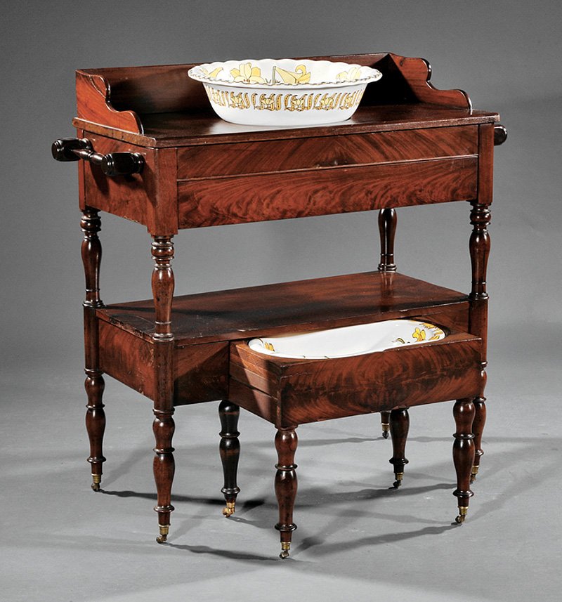 French Carved Mahogany Table de Toilette: Antique French Carved Mahogany Table de Toilette, early 19th c., galleried top fitted with English Art Nouveau wash bowl, turned towel bars, frieze drawer, stretcher shelf with pull out bidet, turned 