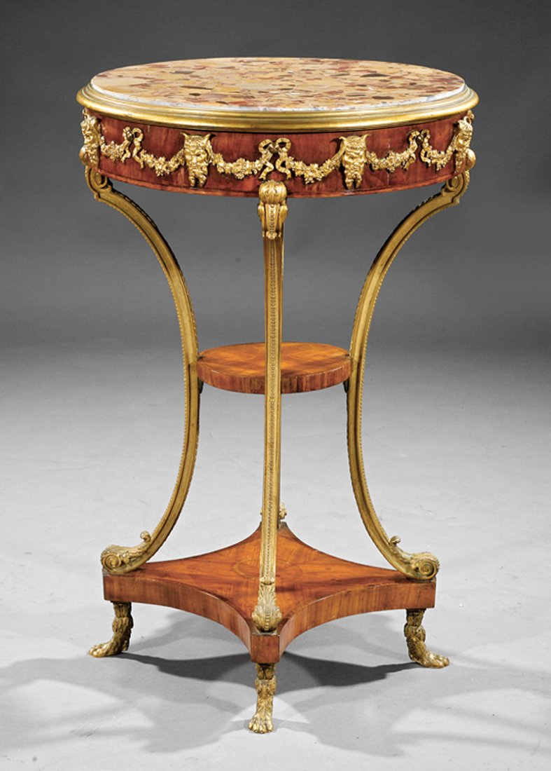 Louis XVI-Style Bronze-Mounted Kingwood Gueridon: Louis XVI-Style Bronze-Mounted Kingwood Gueridon, late 19th c., inset marble top, swagged Bacchus mask frieze, medial shelf, incurvate bronze supports, incurvate plinth, paw feet, h. 33 1/2 in., dia. 