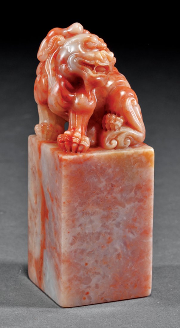 Chinese Shoushan Soapstone Seal: Chinese Shoushan Soapstone Seal, rectangular body surmounted by the figure of a seated Buddhist lion, uncarved chop, h. 4 1/4 in