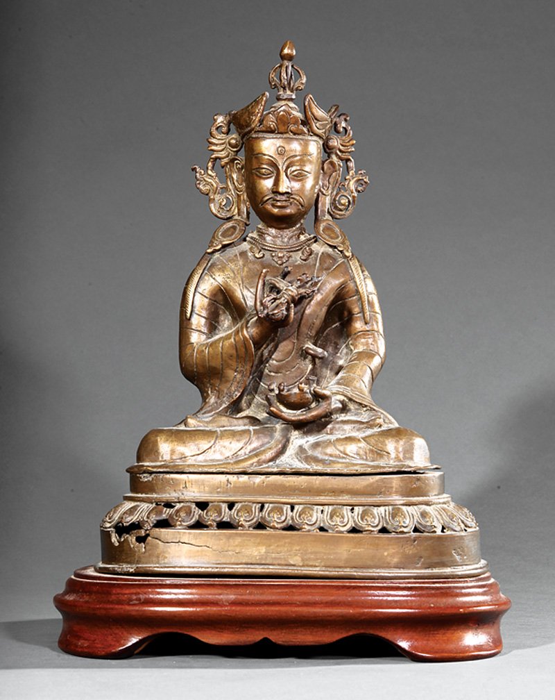 Indian or Southeast Asian Bronze Buddhist Figure: Indian or Southeast Asian Bronze Buddhist Figure, cast seated in dhyanasana on a lotus base holding a vajra and a bowl, h. 15 1/4 in., mounted to a lamp base, overall h. 17 1/2 in