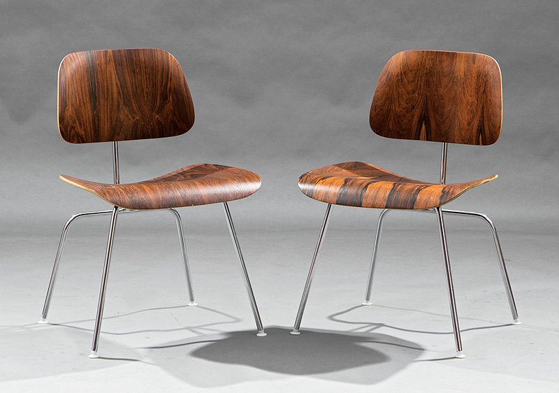 Two Charles and Ray Eames "DCM" Dining Chairs: Two Charles and Ray Eames "DCM" Dining Chairs, modern, with remnants of Herman Miller label, palisander veneer, chrome legs, h. 30 in