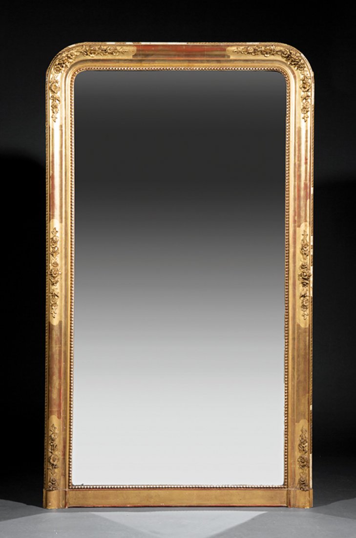 Antique Louis Philippe Carved and Gilded Mirror: Antique Louis Philippe Carved and Gilded Mirror, early 19th c., beaded and foliate carved surround, burnished and matte frame surface, h. 71 1/2 in., w. 41 1/2 in. Provenance: The Gotlib Collection