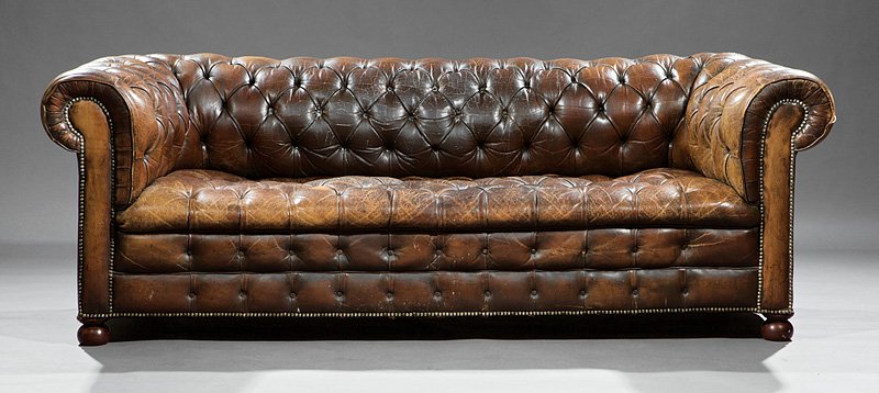 Edwardian Leather Chesterfield Sofa: Edwardian Button-Tufted Leather Chesterfield Sofa, c. 1890-1910, nailhead trim, turned feet, h. 30 in., w. 85 in., d. 36 in. Provenance: Lynda Willauer, Nantucket, MA