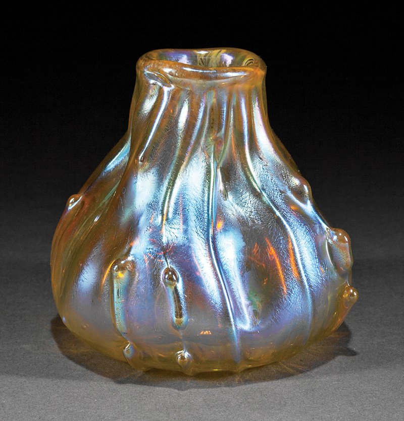 Tiffany Favrile Free-Form Glass Vase: Tiffany Favrile Free-Form Glass Vase, marked "X2203", iridescent globular shape with random ribs and spots, h. 3 5/8 in Illustrated: Steeg, Moise S. Tiffany Favrile Art Glass. Atglen: Schiffer, 1997, 