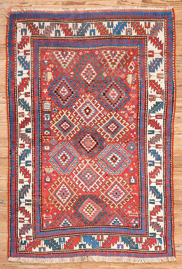 Persian Kazak Carpet: Small Persian Kazak Carpet, red central ground, repeating diamond medallions, 6 ft. 2 in. x 4 ft. 5 in. Provenance: D. Benjamin Kleinpeter, Sr. Collection, Baton Rouge