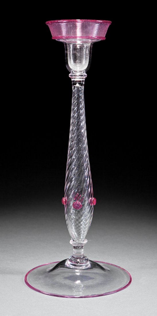 Steuben Amethyst and Clear Glass Candlestick: Steuben Amethyst and Clear Glass Candlestick, marked "Steuben", with remnants of paper label, h. 14 1/4 in. Provenance: New Orleans Estate