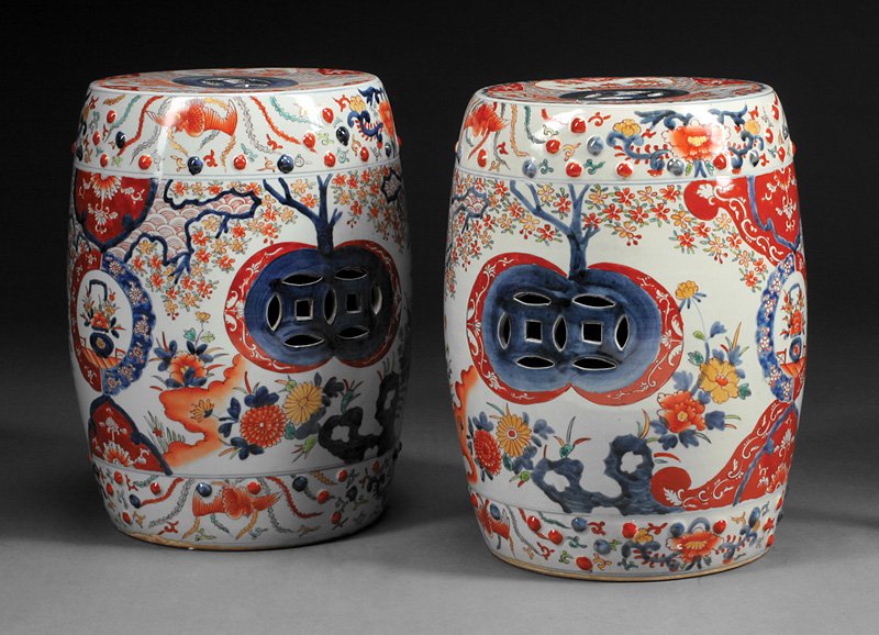 Pair of Imari Porcelain Garden Seats: Pair of Imari Porcelain Garden Seats, barrel-form bodies with pierced cash symbols and raised bosses, h. 18 in