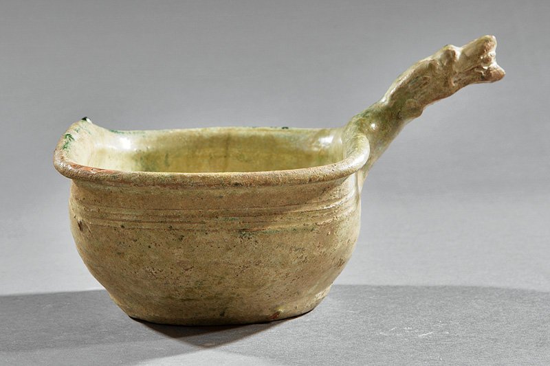 Chinese Green Iridescent Glazed Pottery Ladle: Chinese Green Iridescent Glazed Pottery Ladle, probably Eastern Han Dynasty (206 BCE -220 CE), square body on round foot with dragon head handle, h. 4 7/8 in., w. 7 3/4 in. Provenance: Reputedly Ex-Co