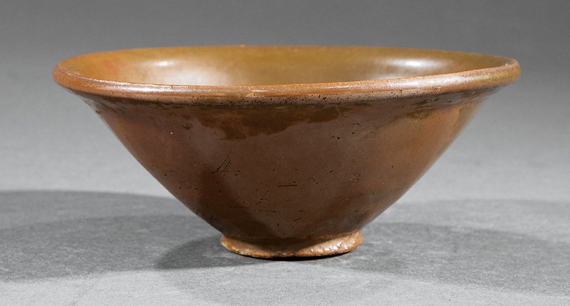 Chinese Brown Glazed Stoneware Tea Bowl: Chinese Brown Glazed Stoneware Tea Bowl, probably Ming Dynasty (1368-1644), conical body with everted rim, h. 2 in., dia. 4 5/8 in. Provenance: accompanied by a copy of the Sotheby Parke Bernet, NY, s