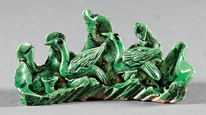 Chinese Green Glazed Pottery Brush Rest: Chinese Green Glazed Pottery Brush Rest, Qing Dynasty (1644-1911), modeled as geese amid rockwork, h. 2 1/4 in., l. 4 5/8 in. Provenance: accompanied by a copy of the Eric Hudes, London, invoice, date