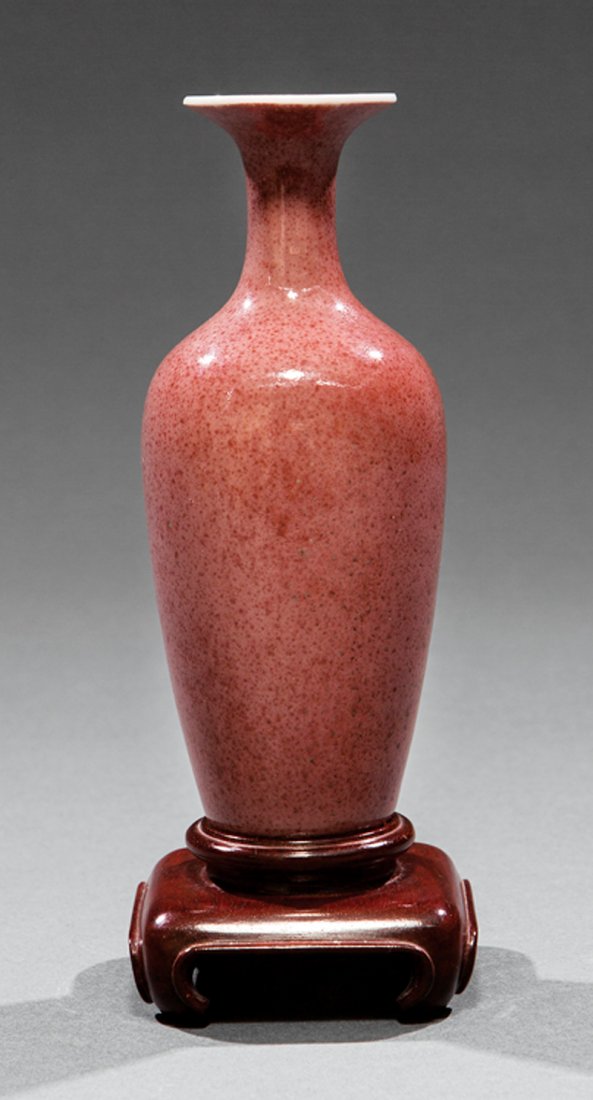 Chinese Peachbloom Glazed Porcelain Amphora Vase: Chinese Peachbloom Glazed Porcelain Amphora Vase, probably 19th c., overall slightly mottled mushroom-pink glaze, base with Kangxi mark, h. 6 1/2 in., wood stand, overall h. 7 in. Provenance: New Orle
