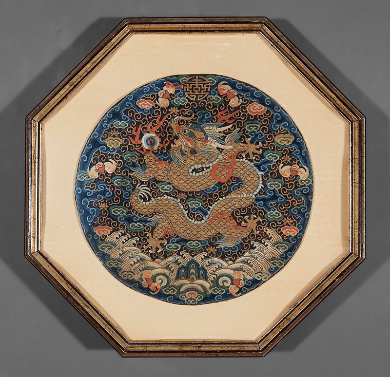 Chinese Embroidered Silk Kesi Dragon Roundles: Pair of Chinese Embroidered Silk Kesi Dragon Roundels, probably Qing Dynasty (1644-1911), worked in slit-weave technique and couched gold threads with dragons amid clouds and bats above waves, dia. 11