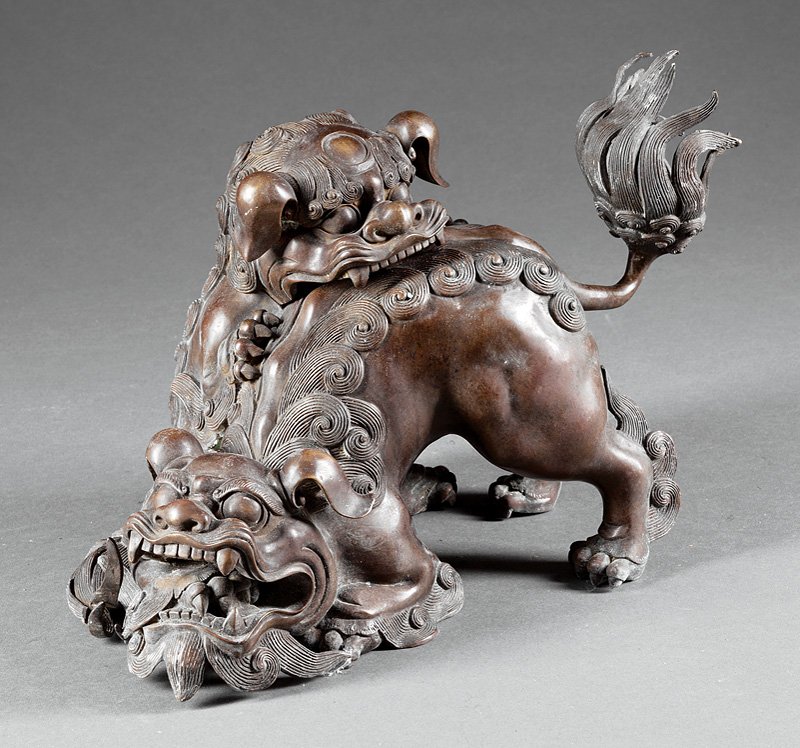 Chinese Bronze Figural Group: Chinese Bronze Figural Group, modeled as a pair of entwined Buddhist lions, one with removable head, h. 9 3/8 in., w. 12 1/4 in