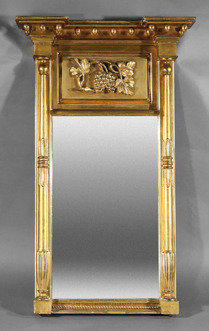 American Classical Carved Giltwood Looking Glass: American Classical Carved Giltwood Looking Glass, early 19th c., New York, outset cornice, acorn pendants, grape cluster panel surrounded by rope twist border, flanked by tapered anthemia, reeded colu