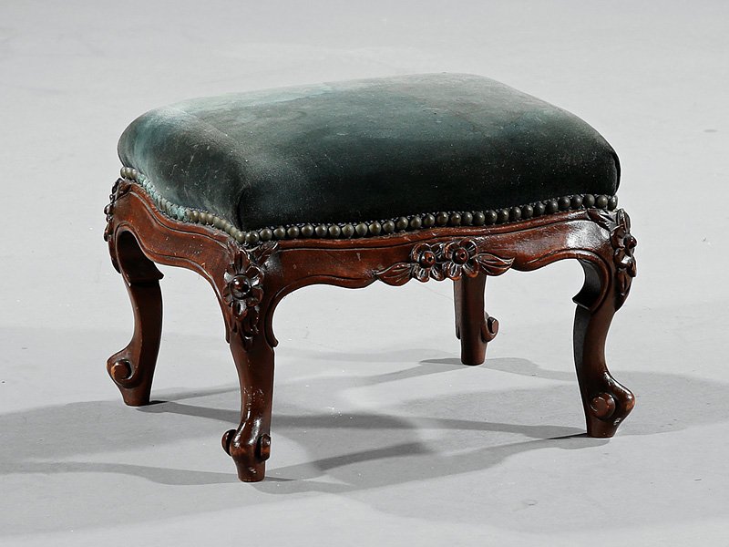American Rococo Carved Mahogany Footstool: American Rococo Carved Mahogany Footstool, mid-19th c., floral carved apron and knees, cabriole legs, h. 11 in., w. 14 1/4 in., d. 12 in