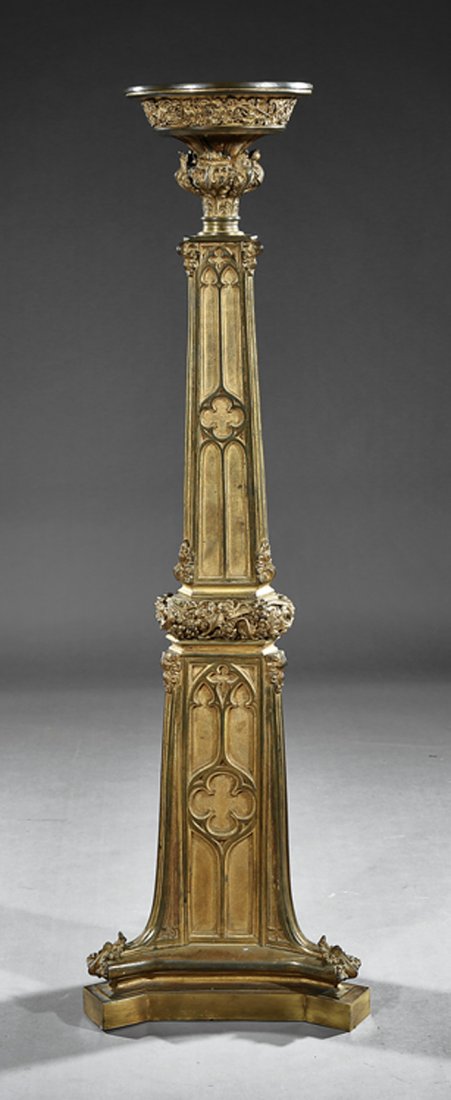 American Gothic Gilt Bronze Torchere: American Gothic Gilt Bronze Torchere, 19th c., tapered triangular standard with tracery and quatrefoils, conforming base, h. 54 1/2 in., top dia. 10 1/2 in., base dia. 17 1/2 in. Provenance: The Servi