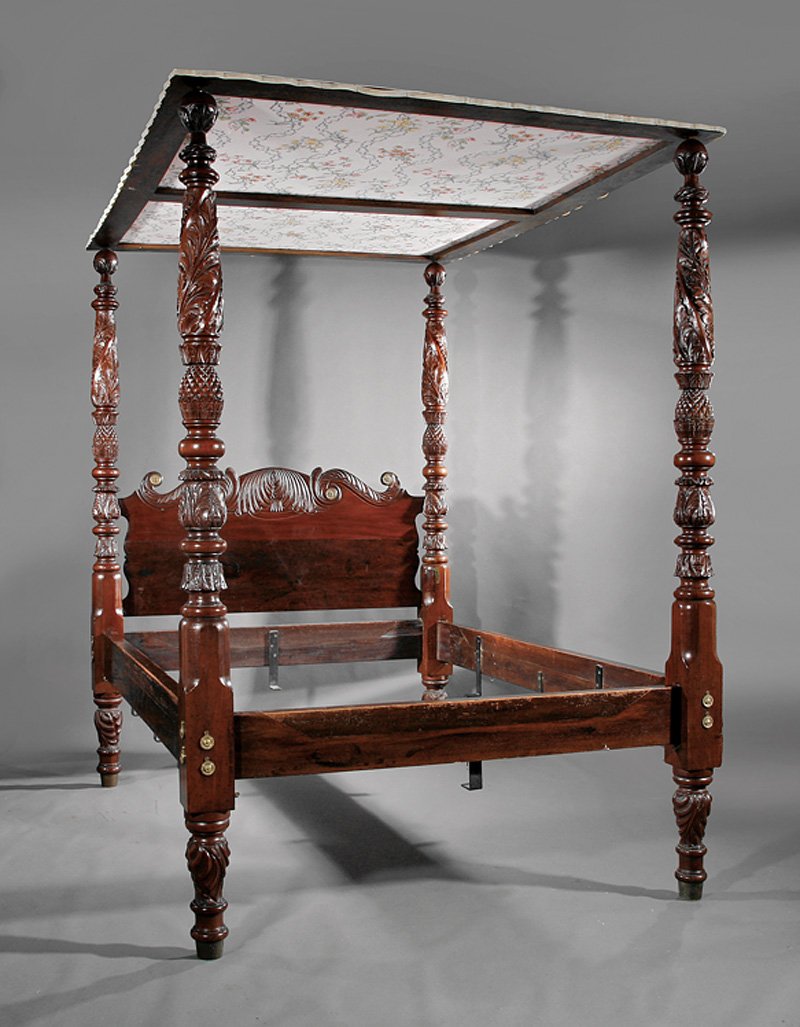 West Indies Carved Mahogany Four Post Bed: West Indies Carved Mahogany Four Post Bed, early 19th c., possibly Jamaica, boldly carved pineapple and acanthine posts with ball finials, flat canopy, scrolled headboard centering a palmette accented