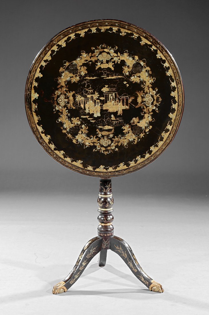 Continental Chinoiserie Tilt-Top Tea Table: Continental Chinoiserie Tilt-Top Tea Table, 19th c., black lacquer ground with gilt court scene and dragon border, turned support, arched sabre legs, paw feet, h. 28 3/4 in., dia. 25 in