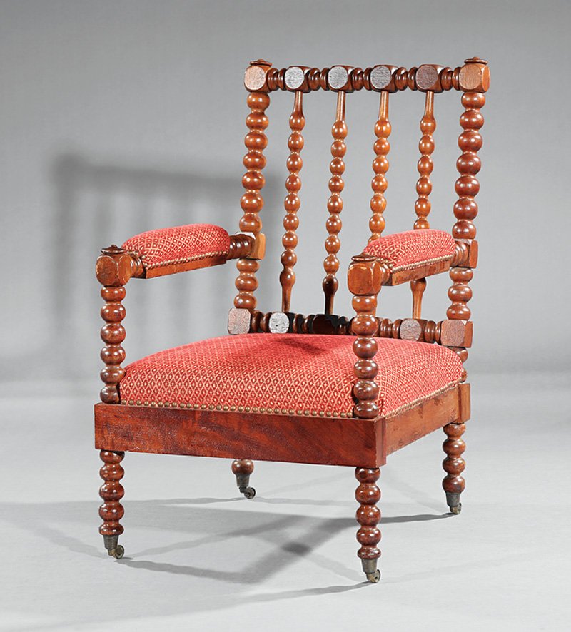 American Carved Mahogany Armchair: American Carved Mahogany Armchair, mid-19th c., bobbin turning throughout; cuff casters, h. 36 in., w. 23 1/4 in., d. 22 in