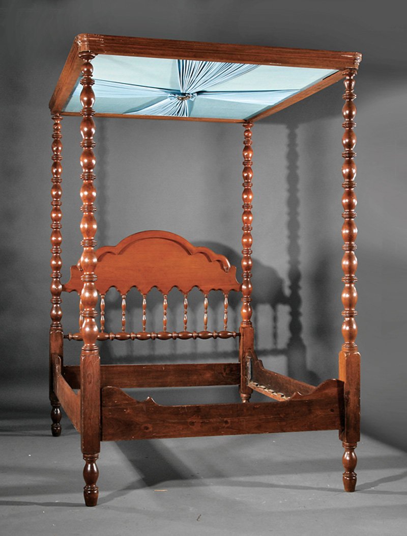 American Carved Walnut Tester Bed: American Carved Walnut Tester Bed, mid-19th c., molded tester, vasiform turned posts, headboard with arched crest and turned uprights, shaped foot board, conforming rails, h. 97 in., interior l. 75 in