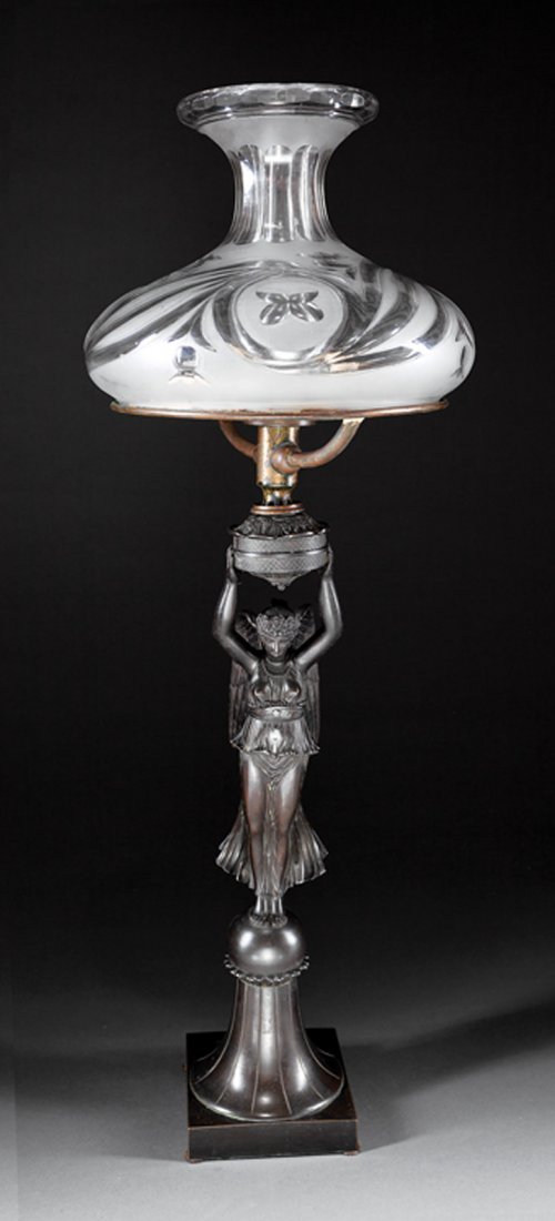 English Patinated Bronze Figural Sinumbra Lamp: English Patinated Bronze Figural Sinumbra Lamp, early 19th c., figure of Nike on a flared pedestal, cut-glass mushroom shade, h. 33 in., dia., 10 1/2 in. Provenance: "The Service Collection", Estate o