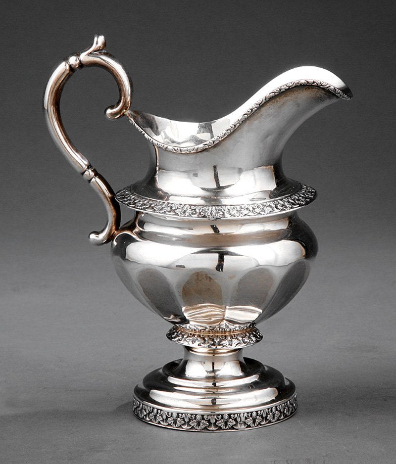 Charleston Coin Silver Creamer, Mood: Charleston Coin Silver Creamer, John Mood, 1792-1864, wc. 1816-1864, marked "J.MOOD" in serrated rectangle, urn form with scroll handle, faceted body and die rolled borders, h. 7 3/4 in., wt. 10.55 tr