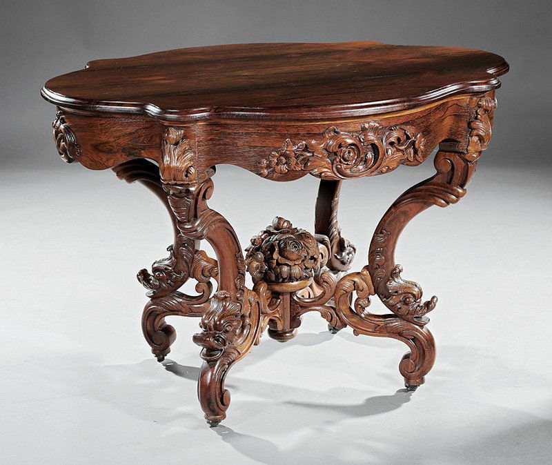 Carved, Laminated Rosewood Center Table, Belter: American Rococo Carved and Laminated Rosewood Center Table, c. 1850-1860, John Henry Belter, New York, in the "Rosalie" pattern, shaped top, conforming apron with carved flowers, S shaped legs with do