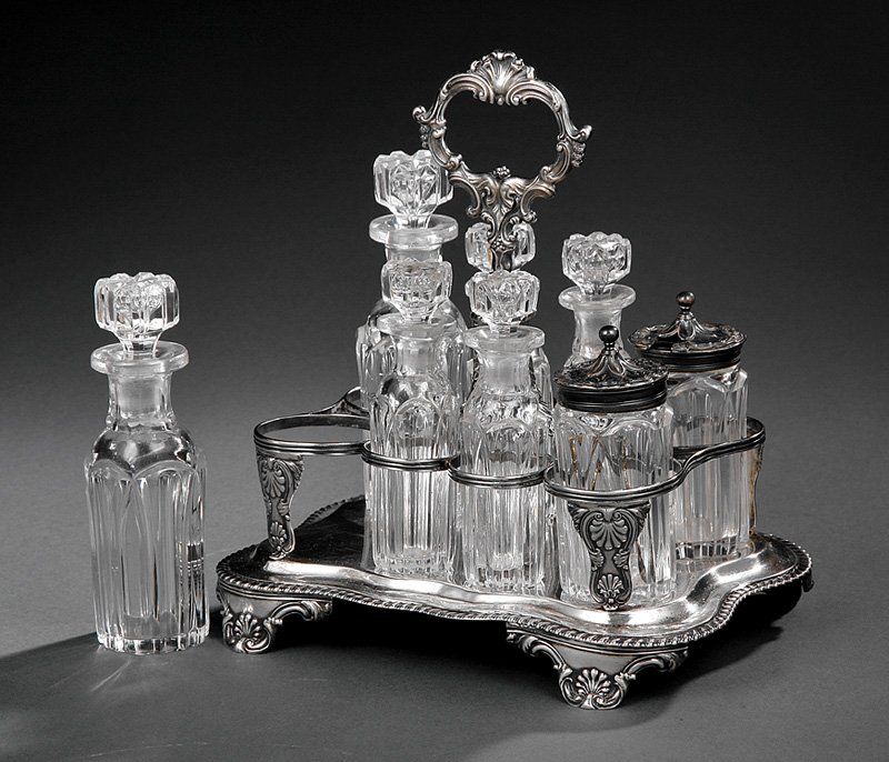 George IV Sterling Silver Cruet Stand: George IV Sterling Silver Cruet Stand, London, 1828, maker TD, probably Thomas Death, mark reg. 1812, crested serpentine stand with central acanthus and scroll handle, gadrooned borders and shell and 