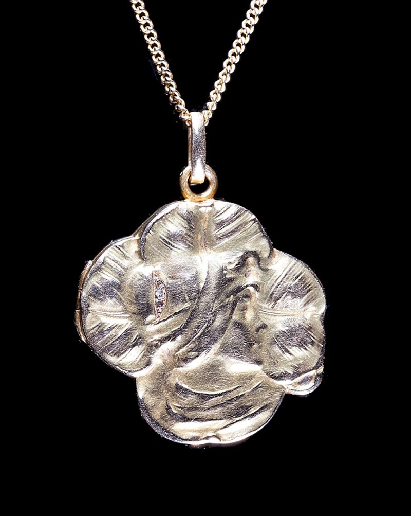 Art Nouveau 18 kt. Yellow Gold and Diamond Locket: Antique French Art Nouveau 18 kt. Yellow Gold and Diamond Locket, with a lady's profile, engraved "1906 Avril 1916 / NETKE", reverse monogrammed, h. 1 1/4 in., w. 1 1/8 in., gold chain, l. 14 7/8 in. 