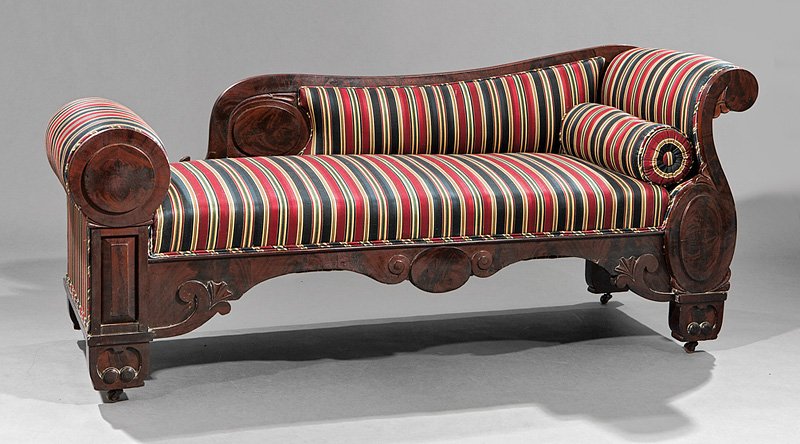 American Classical Carved Mahogany Meridienne: American Classical Carved Mahogany Meridienne, c. 1830, Philadelphia, shaped back, scrolled arm, foot with secret compartment, carved seat rail, casters, h. 32 in., w. 70 in., d. 23 1/4 in. Provenance