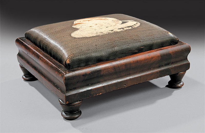 American Late Classical Mahogany Footstool: American Late Classical Mahogany Footstool, c. 1840, needlework seat decorated with a calico cat resting on a cushion, ogee molded seat frame, turned feet, h. 6 1/2 in., w. 14 1/2 in., d. 12 1/2 in