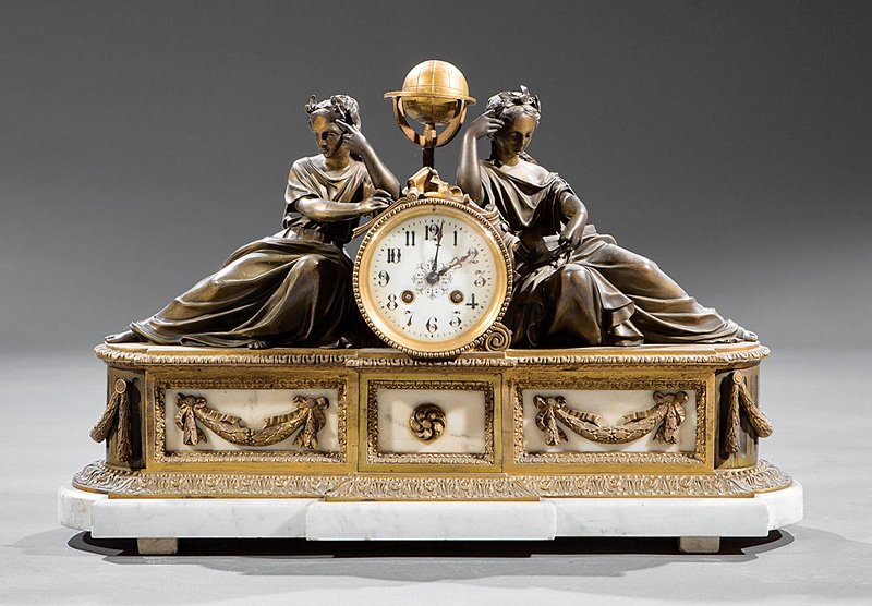 Napoleon III Bronze and Marble Mantel Clock: Napoleon III Bronze and Marble Mantel Clock, probably late 19th c., reclining Muses with terrestrial globe, h. 15 in., w. 22 1/2 in., d. 7 in. Provenance: Estates of Eva and Jerry Gotlib, New York, NY