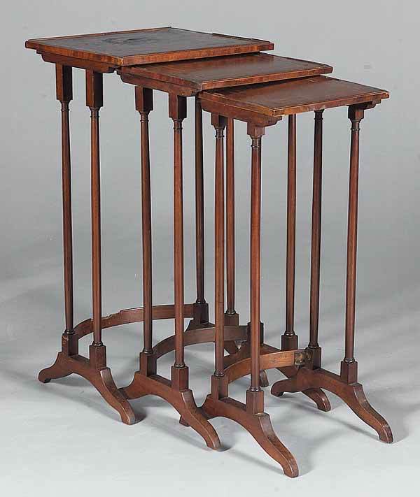 Set of Antique Regency-Style Inlaid Mahogany 19th: A Set of Antique Regency-Style Inlaid Mahogany Nesting Tables , 19th c., with banded and molded edge accented by light wood and ebony stringing, raised on turned tapered legs connected by stretchers,