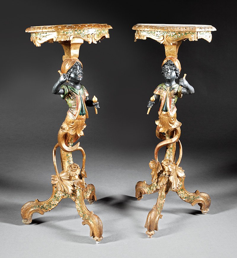 Italian Carved Polychromed Blackamoor Gueidons: Pair of Antique Italian Carved Polychromed Blackamoor Gueridons, mid-to-late 19th c., shaped gadrooned tops painted with scenes of the Piazzetta and the Molo in Venice, blackamoor figures issuing from