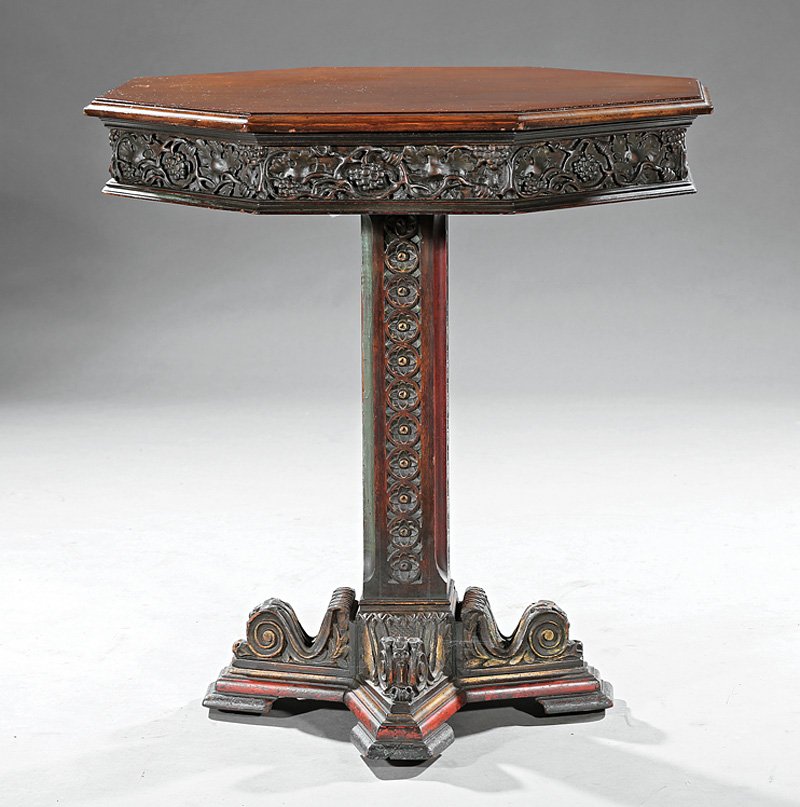 Mahogany Parcel-Gilt Paint-Decorated Center Table: Antique Carved Mahogany, Parcel-Gilt and Paint-Decorated Center Table, 19th c., molded octagonal top, vine and leaf-carved frieze, rosette-carved standard, molded stepped plinth, scrolled foliate brac