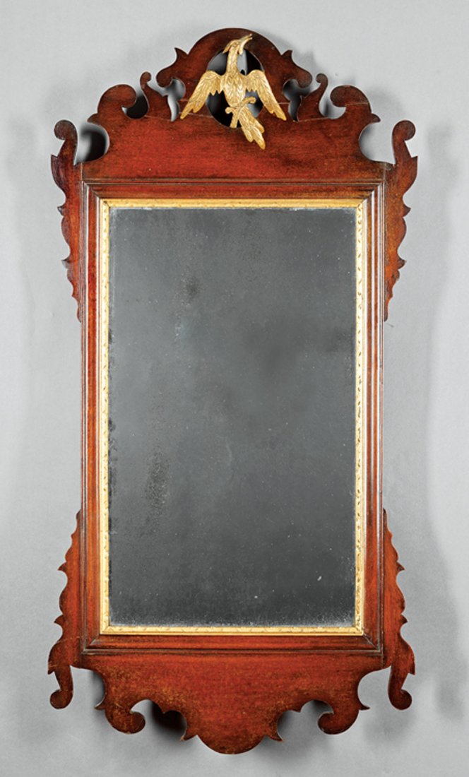 Georgian Mahogany and Parcel Gilt Looking Glass: Georgian Mahogany and Parcel Gilt Looking Glass, late 18th c., shaped surround with ho-ho bird, old mirror plate, h. 38 in., w. 19 1/4 in