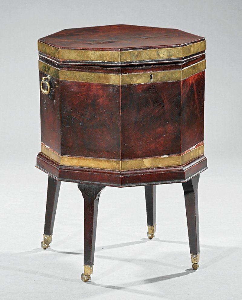 Regency Brass-Bound Mahogany Cellarette: Large Regency Brass-Bound Mahogany Cellarette, early 19th c., octagonal, open interior, brass handles, stand with tapered legs, cuff casters, h. 29 1/2 in., dia. 21 in