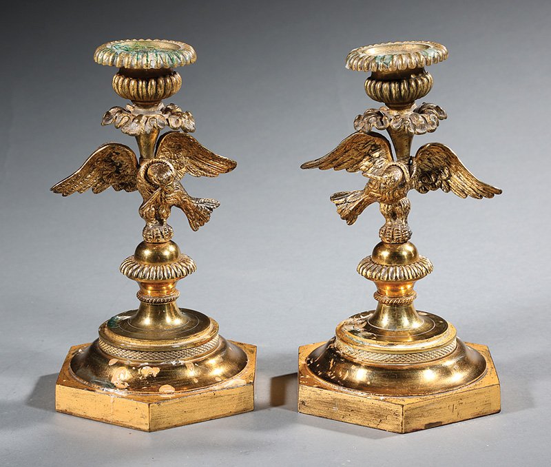 French Gilt Bronze Figural Candlesticks: Pair of French Empire-Style Gilt Bronze Figural Candlesticks, eagle standards, foliate and ribbed mounts, hexagonal bases, h. 8 5/8 in. Provenance: Historic "Sally Mill", Middleburg, VA